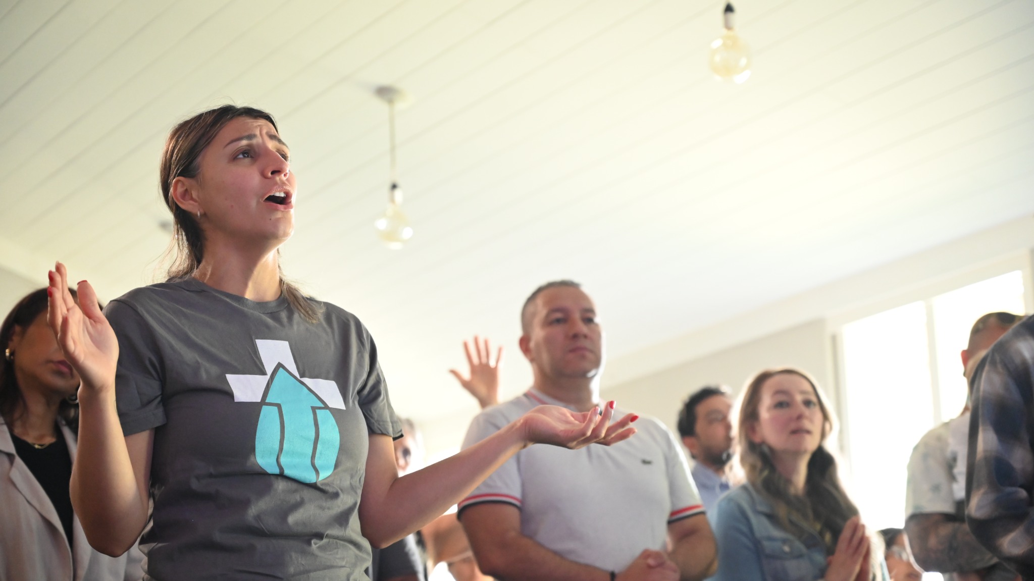 A baptism participant worships with the congregation at Broad River Church.